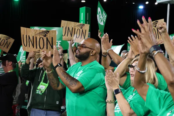 AFSCME Council 8 Member and Local 1632 President Will Harmon introducing President Saunders